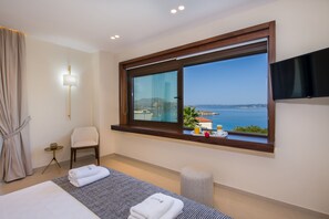 4 chambres, coffres-forts dans les chambres, fer et planche à repasser