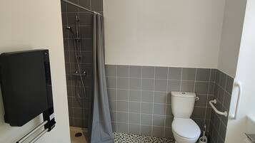 Shower, free toiletries, towels, soap