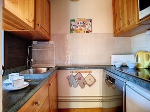 Fridge, microwave, dishwasher, coffee/tea maker