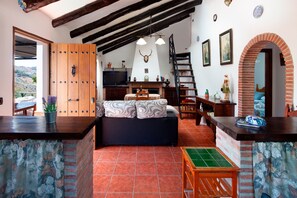 TV, fireplace - Holiday Home Casita T with Mountain View, Pool & Wi-Fi (Canillas de aceituno)