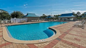 A swimming pool with a 4 ft depth marker, lounge chairs, and covered seating areas. - Pool, Fitness Center & Central Location, Blue Mountain Beach + Free Tickets! (Santa Rosa Beach)