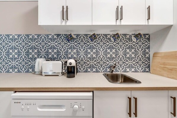 Fridge, microwave, dishwasher, coffee/tea maker