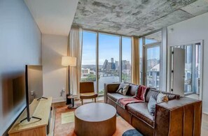 TV, offices - Luxury 2BR |Heated Rooftop Pool| Austin by Barclé (Austin)