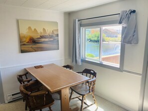 C1 Family Cabin, 2 Bedrooms, Kitchen, Riverfront, Private Balcony, No Pets | Dining room - Raines Resort Cabins & RV (Cloverdale)