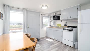 C4 Premium Cabin, 2 Bedrooms, Kitchen, Riverfront, Private Balcony, No Pets | Private kitchen | Microwave, coffee/tea maker, cleaning supplies, paper towels