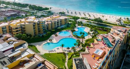 NEW Ocean-View Condo *steps from Eagle Beach*