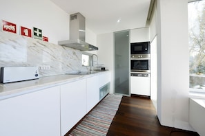 Dishwasher, highchair, dining tables