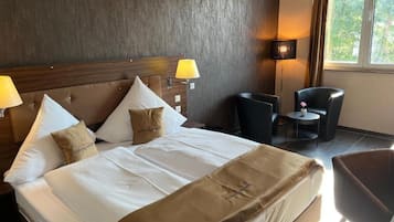 Coffres-forts dans les chambres, fer et planche Ă repasser
