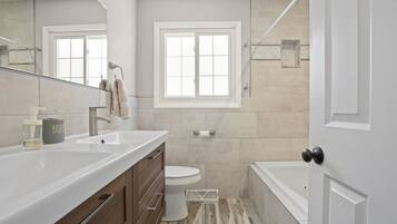 Combined shower/tub, jetted tub