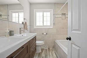 Combined shower/tub, jetted tub