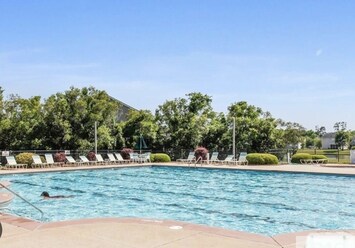 Cool off 💦 during the summer in our refreshing large community swimming pool!