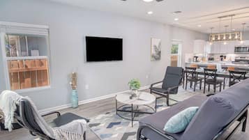 House (4 Bedrooms) | Living area | 50-inch TV with digital channels