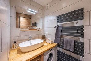 Shower, hair dryer, towels, toilet paper