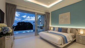 A modern bedroom with a large bed, a nightstand, a bedside table, a vase with flowers, and a view of the outdoors through a sliding glass door. - 3 Bedroom Ocean View Villa Aura SDV009-By Samui Dream Villas (Koh Samui)