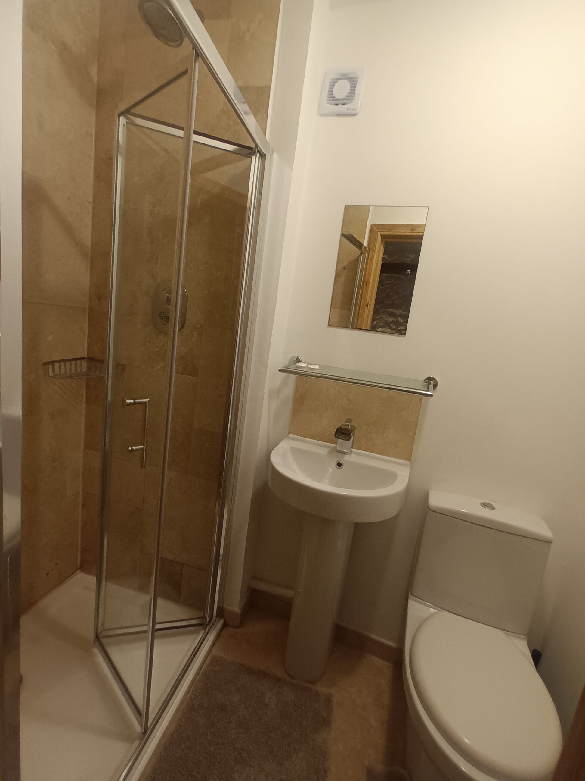 Shower, towels, soap, toilet paper