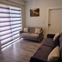 Quarto família | Frigobar, cofres nos quartos, espaço de trabalho para notebook