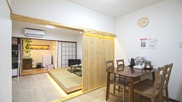 Family House | Living area | 32-inch flat-screen TV with cable channels