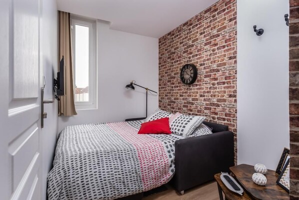 1 chambre, fer et planche à repasser, Wi-Fi gratuit, draps fournis