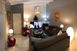 Vila, várias camas | Sala de estar