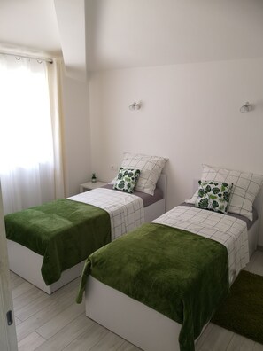2 bedrooms, in-room safe, iron/ironing board, WiFi