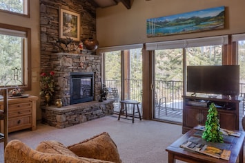 Living Room with Fireplace and Big Deck - Living Room with Fireplace and Big Deck