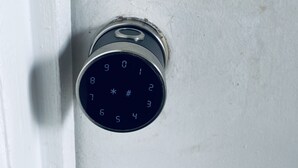 A door lock with a numeric keypad. - Beautiful 2 bedroom house walking distance from hard rock stadium (Miami Gardens)