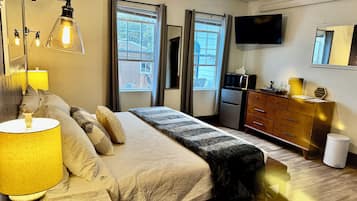 1 bedroom, desk, blackout drapes, iron/ironing board