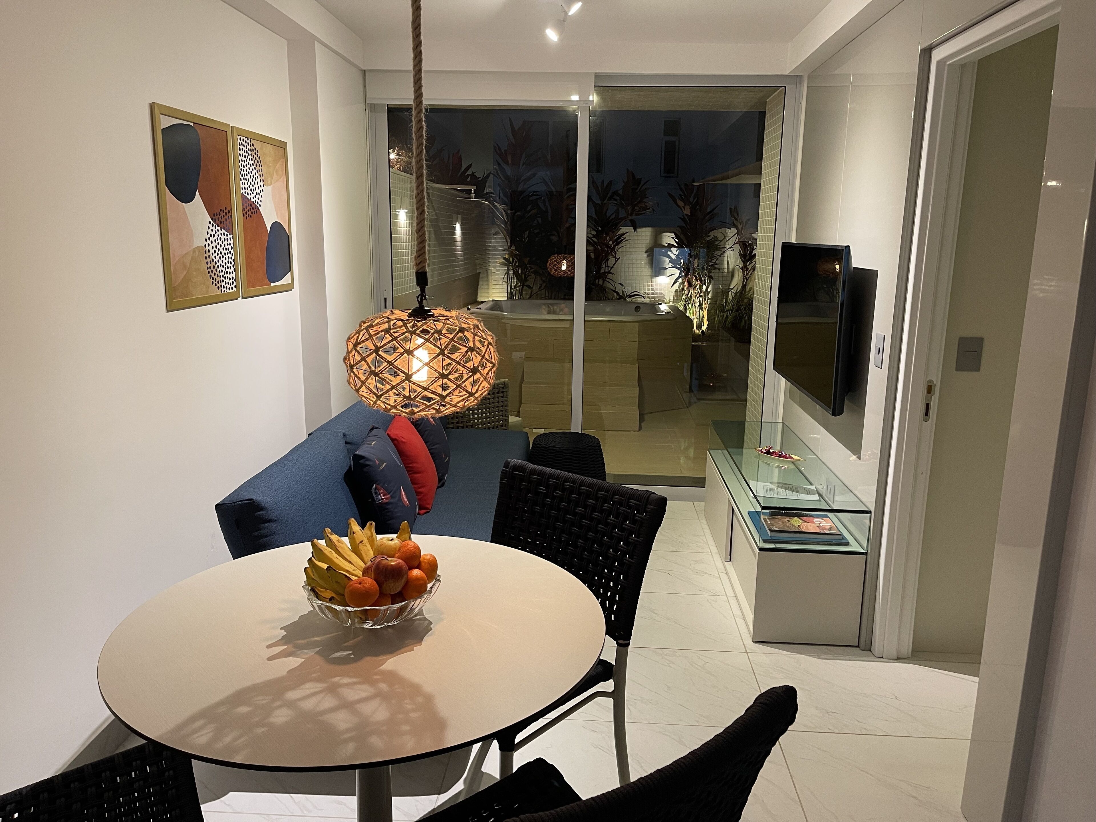 Signature Apartment | Living area | 42-inch LCD TV with digital channels