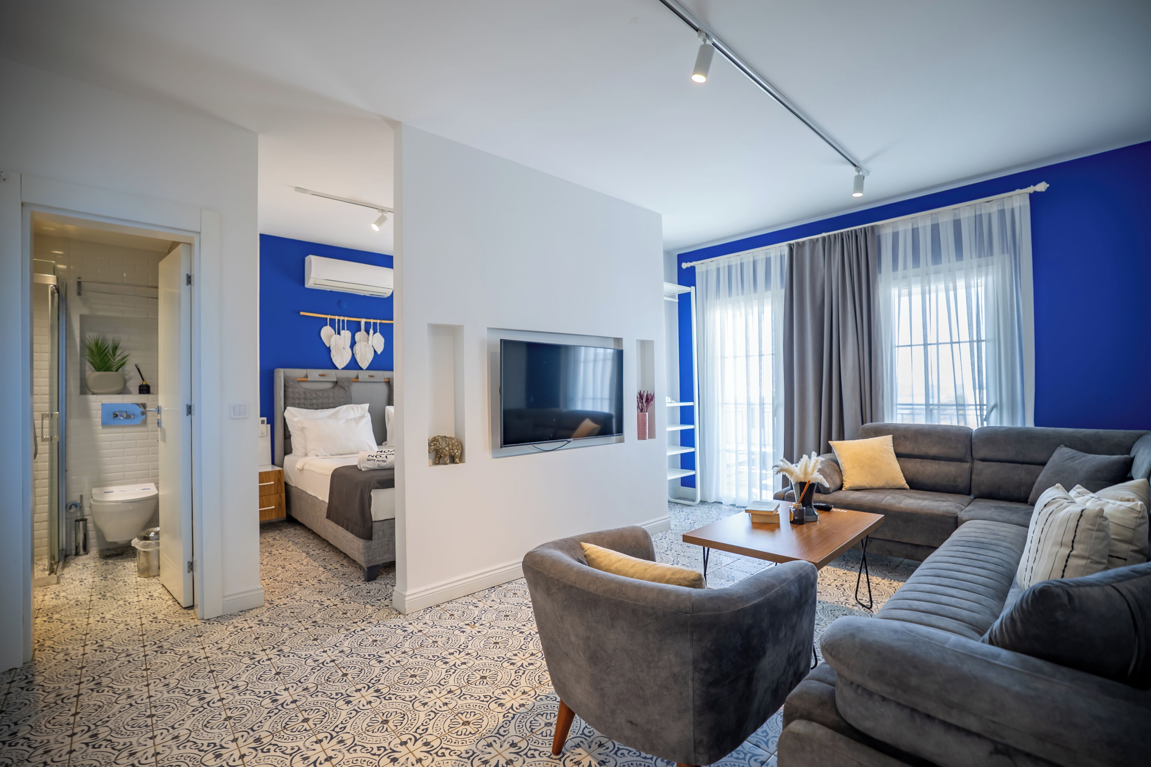 Sea View Apartment with Balcony | Living area | 40-inch Smart TV with cable channels, TV