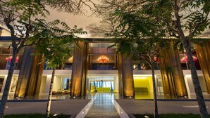 A modern hotel entrance with a central pathway, large columns, and a well-lit interior. - Yoo Panama & Arts Tower (Panama City)