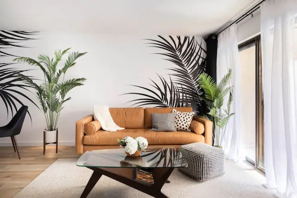 The Living Room with comfortable leather couch.