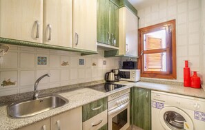 Fridge, microwave, stovetop, cookware/dishes/utensils