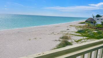 On the beach, sun loungers, beach towels