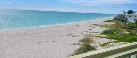 On the beach, sun loungers, beach towels