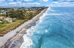 On the beach, sun-loungers, beach towels
