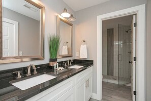 Bathtub, hair dryer, towels, soap