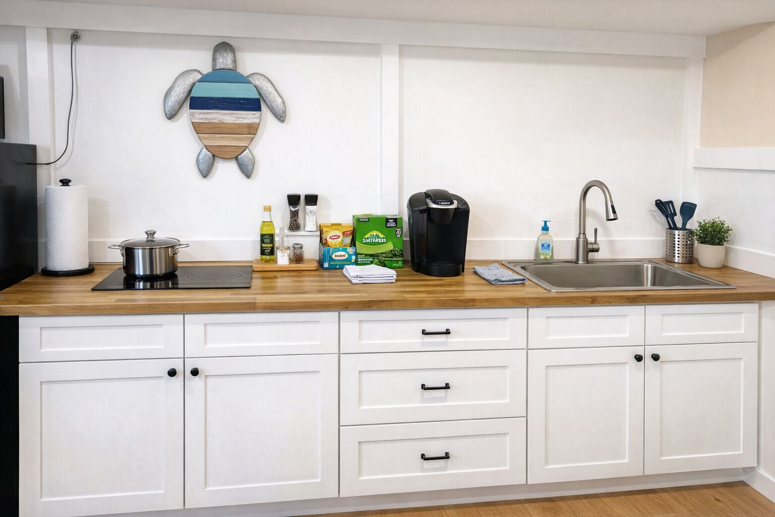 Fridge, microwave, stovetop, coffee/tea maker