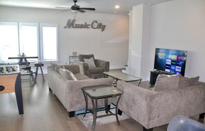 Living area - NEW, Spacious House w/ Patio & Foosball - 10 min from BNA! (Nashville)