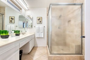 Bathtub, hair dryer, towels, soap