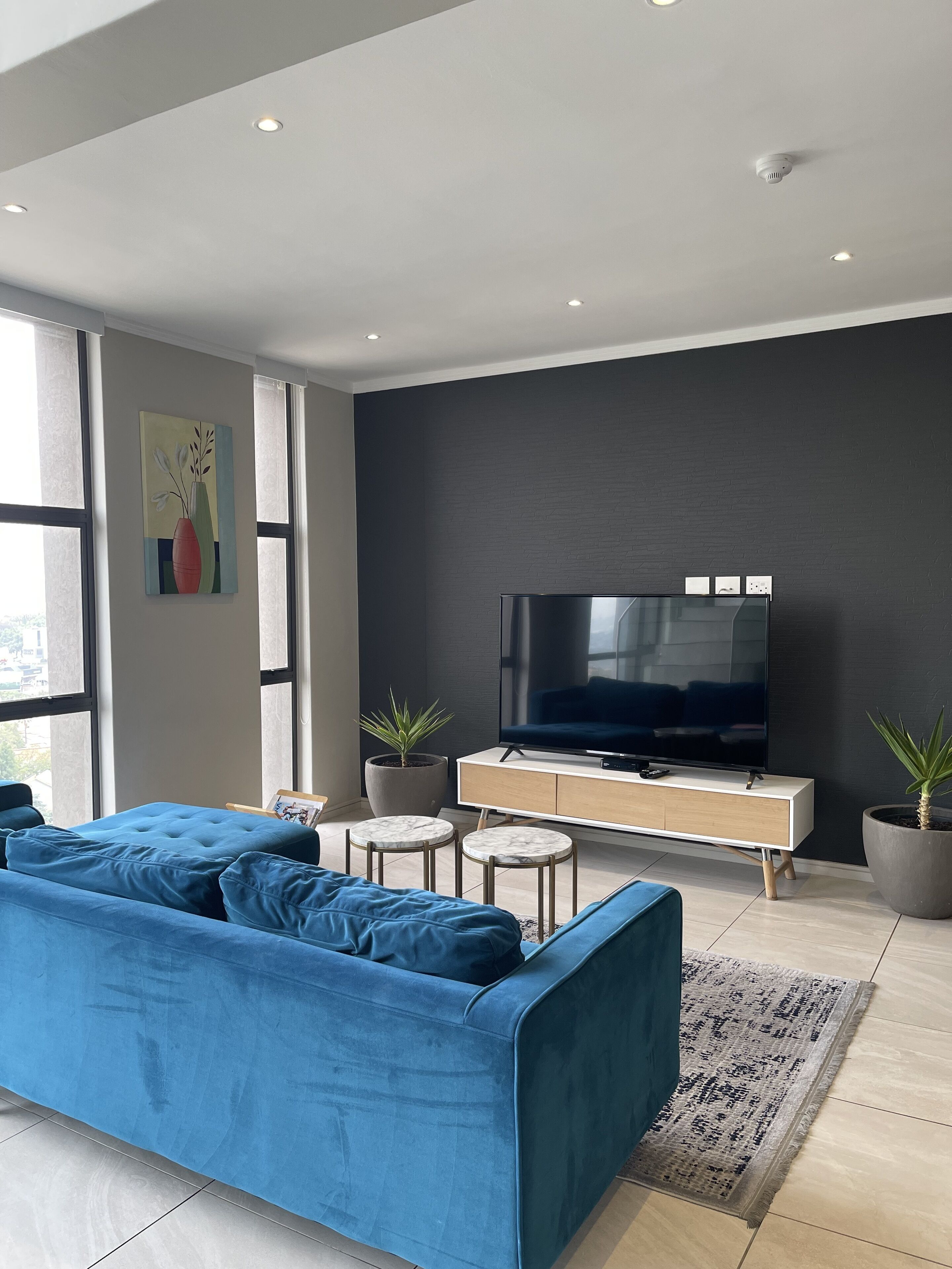 Presidential Penthouse, 3 Bedrooms, Ensuite, City View | Living room | 45-inch Smart TV with cable channels, TV, Netflix