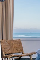 Apartment - Seabreeze (Beachfront) | Living area | 40-inch flat-screen TV with cable channels, TV