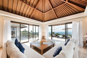 Villa Feronia | Living area | 43-inch LCD TV with cable channels, TV - Karang Saujana Estate (Kutuh)