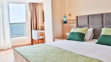 Hypo-allergenic bedding, free minibar, in-room safe, blackout drapes