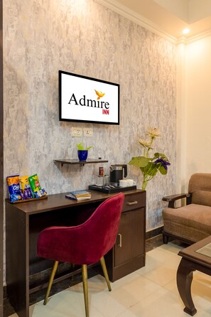 Superior Room | Living area | 40-inch LED TV with satellite channels, TV - Hotel Diamond Stay by ASPL (Noida)