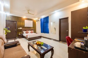 Superior Room | Living area | 40-inch LED TV with satellite channels, TV - Hotel Diamond Stay by ASPL (Noida)