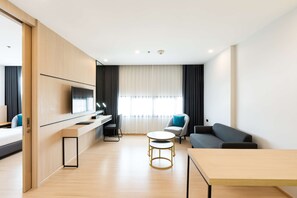 Suite, 1 King Bed, Non Smoking (Living Room) | Living area | 42-inch LCD TV with digital channels, TV