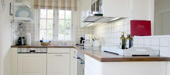 Haushälfte mit 4 Zimmern in Wyk auf ca. 120m² mit Garten und Terrasse