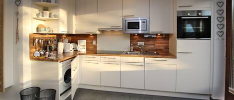 Microwave, oven, dishwasher, high chair