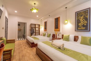A hotel room with two beds, a wooden bench, a desk, and a bathroom with a shower. - Angkor Rithy Residence (Siem Reap)