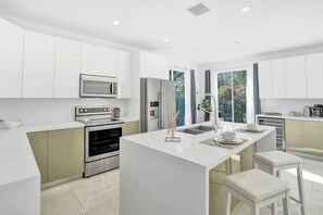 House | Private kitchen | Full-size fridge, coffee/tea maker, highchair - 4BR Hollywood Beach Home with Pool (Hollywood)